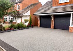 Remys Surfacing and Haulage - Driveway Dropped Kerb Tarmac Resin Bound Haulage Contractors